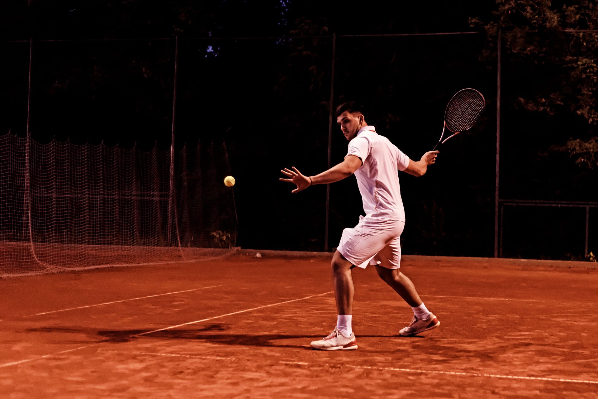 Tennis player at clay court during match